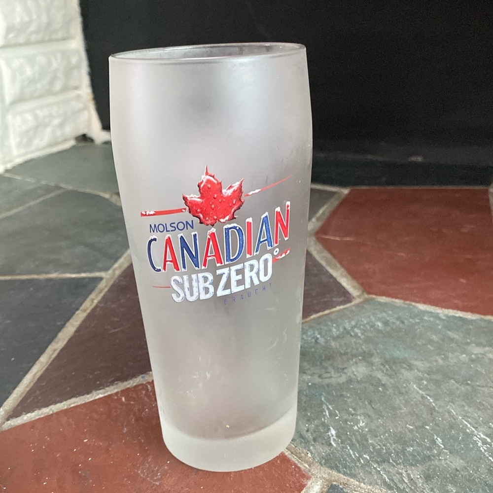 Molson Canadian Subzero pint beer glass frosted.